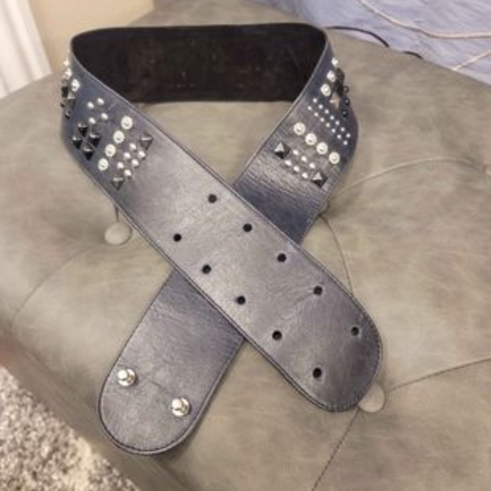 Raina leather belt.